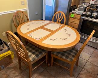Kitchen table with foldable leaf. 