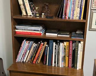 Bookshelf with two matching dressers and a twin trundle bed are available for presale.