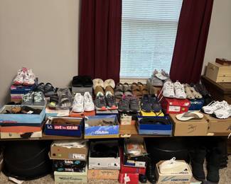 Lots of shoes and slippers many are brand new