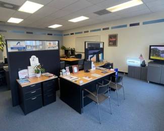 TV's, cabinets, chairs, dividers, plants