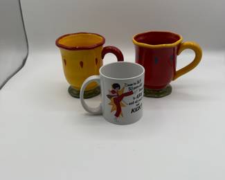 This auction lot includes a set of three fun mugs, featuring vibrant colors of red and yellow, perfect for collectors and home decor enthusiasts. The small white mug adds a humorous touch with a unique saying. See pictures for more details.