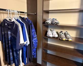 Huge Golf attire collection, shirts in sizes Medium and Large. Includes various golf shirts in different styles and colors, accompanied by two pair of men's golf shoes. See pictures for more details.