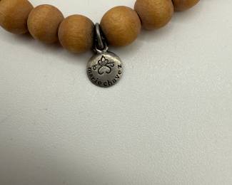 Mixed Bracelet Lot featuring a wooden bangle and assorted beaded bracelets with silver accents. See pictures for more details. Marie Chavez