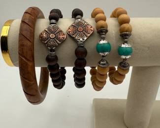 Mixed Bracelet Lot featuring a wooden bangle and assorted beaded bracelets with silver accents. See pictures for more details.