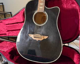 This is a numbered limited edition Keith Urban Nightstar Guitar made by Yamaha. The Certificate of Authenticity states 17,613/25,900. It is in very good used condition and comes in a "Gator Cases" hard case. 