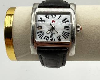 This is a classic bold style from designer watchmaker Michele. Battery recently replaced and in working condition. This Iconic watch is a classic staple piece for any jewelry wardrobe. Battery recently replaced, appears to be working, future mechanical state not guaranteed.