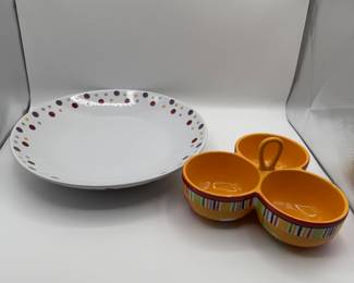 This is a set of coordinating serving dishes that include a large dish from Pampered Chef Simple Additions and a three section condiment server from Crate and Barrel. 