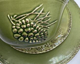 This is a beautiful vintage collection of dinnerware. High end everyday dinnerware meant to stand the test of time. The dinnerware has a pine cone motif and his accompanied by modern deep cereal/salad bowls. Set count is as follows:

12 Dinner Plates
12 Salad Plates
11 Green Cereal Bowls
9 Modern Stripe Bowls
4 Small white tapas bowls