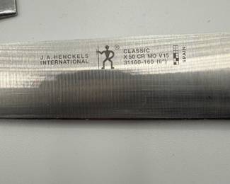 A diverse collection of kitchen utensils and cutlery, including forks, knives, spatulas, and more. Ideal for cooking enthusiasts or anyone looking to enhance their kitchen tools