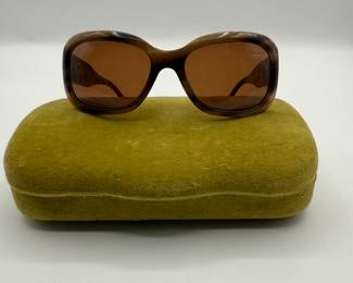 Chanel Oversized Sunglasses - Signature Chanel Style! Oversized sunglasses featuring a brown gradient lens, made of a brown tortoiseshell-like material. The frame has a smooth, glossy finish with a distinctive shape. Side arms are adorned with an embossed Chanel logo and feature additional branding on the inner arm. Comes with a velvet Gucci case, with a blue interior. Minor condition issue, small scratches on one edge, see photos for details.
