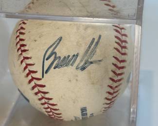 The ball has a blue signature that reads 'Bruce Chen' from his time with the Kansas City Royals. It is enclosed in a clear, square acrylic display case.