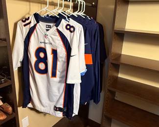 NFL Apparel Lot featuring a Denver Broncos jersey (number 81) along with additional team apparel. See pictures for more details