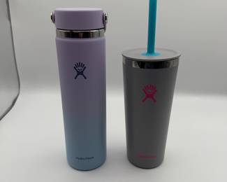 Set of two Hydro Flask items including an ombre water bottle and a grey cup with a straw. New condition. Perfect for keeping your drinks cold or hot. See pictures for more details.
