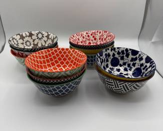 This is a fun collection of 11 bowls for cereal, salad or other eating. All of the bowls are in very good used condition. 