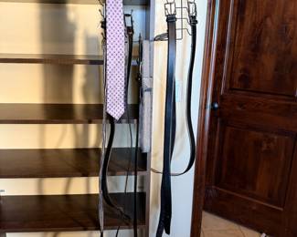 Men's accessories lot with belts sizes 34-36 belts, leather, black and brown, one reversible and two fabric belts. One belt is brand new with tags. There is one tie