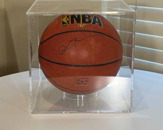 This is an official NBA Basketball autographed by Allen Iverson. The basketball is housed in a protective plexiglass box. 