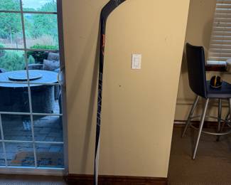 This is a collectible hockey stick signed by multiple players from the Colorado Avalanche. 
