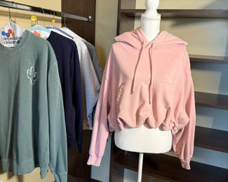 Fashionable sweatshirts that include a pink cropped hoodie from the Gap and additional assorted sweatshirts. Perfect for casual wear or layering. See pictures for more details