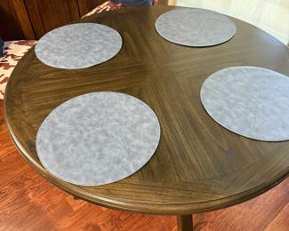 This is a set of beautiful blue vegan leather placemats from Crate and Barrel. The feature a textured finish and topstitching