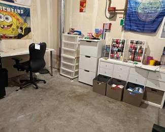 This is a huge collection to set up your crafting paradise! A desk, storage and a jump start with some yarn, beads, ribbons and other supplies. This item is in the basement workshop and winner must be prepared to remove and transport. 