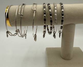 Alex and Ani stack of bracelets featuring a mix of adjustable and wrap. Ornate heart wrap, February charm, beaded bracelets. Includes various styles and materials. See pictures for more details.