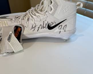 Harrison Phillips of the Minnesota Vikings #99 - Game cleat and glove. Ready for any football fan to add to their collection!
