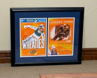 This is a Wheaties collectors box signed by professional skier Lindsey Vonn. 
