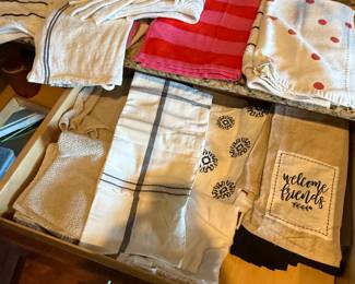 Huge Collection of Kitchen Towels!!!! This collection features various styles and designs including striped, polka dot, and decorative towels. Ideal for kitchen use or decorative purposes. See pictures for more details.