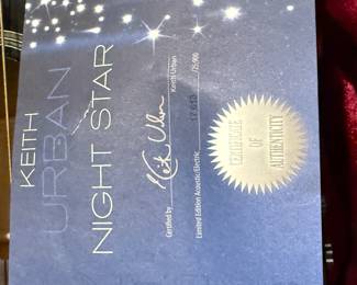 This is a numbered limited edition Keith Urban Nightstar Guitar made by Yamaha. The Certificate of Authenticity states 17,613/25,900. It is in very good used condition and comes in a "Gator Cases" hard case. 