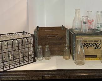 Various milk bottles and crates