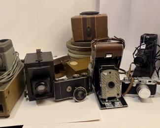 1930s-1950s vintage camera lot. Much more. Polaroid, Canon, Kodak, Leica accessories, 100s vintage pictures, projectors and reels 