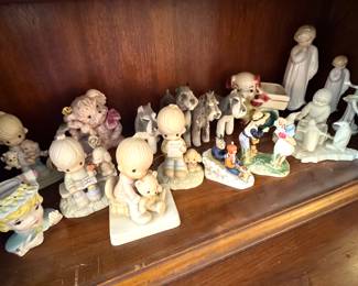 Assorted Figurine Collection Featuring Precious Moments, Animals, and Vintage Ceramic Pieces
