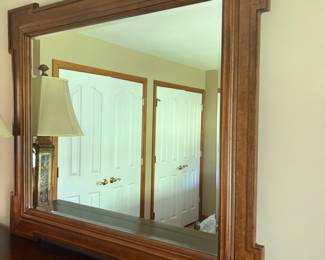 Mirror attached to long dresser 