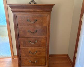 This chest also is a jewelry  box. Sides  and top open to hold jewelry 