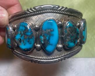 hug heavy sterling signed native American turquoise cuff