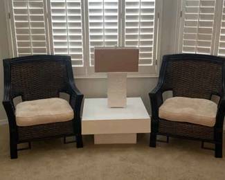 Two Identical Chairs With White Coffee Table And Lamp
