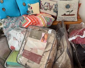 Large Assortment Of Blankets And Pillows