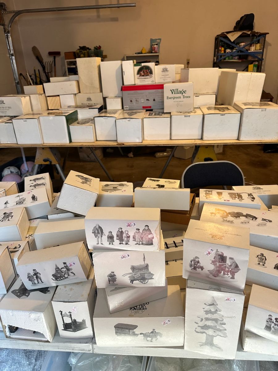There are over 100 Dickens Village houses and collectibles in this sale - almost all with original box!