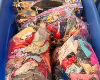 Lots of Barbie clothes and Barbies - some new in box!