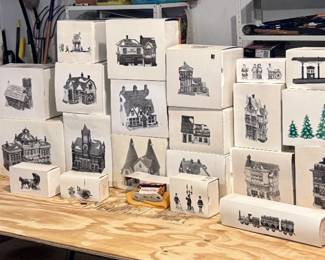 There are over 100 Dickens Village houses at this sale, many with the box -- these are just a few!