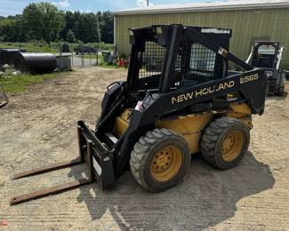 1996 New Holland LX565 skid steer loader, OROPS