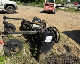 Bobcat 72" hydraulic power rake, quick attach, skid steer mount