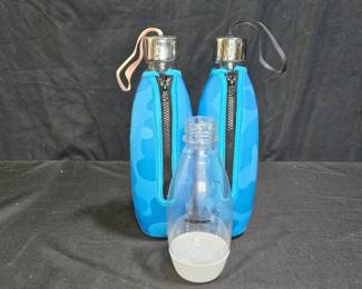 3 Soda Stream Bottles and 2 Sodastream Koozies
