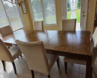 Kitchen table with 3 leaves and 6 fabric chairs $300