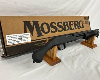 Pump-Action Shotgun with Original Box