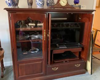 #85 Thomasville Entr. Center w/slide-side doors & 1 Glass Door w/1 drawer & 4 shelves - 60x23x53 - You Move $65.00