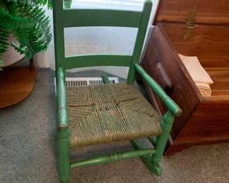 #62 Childs Rocking Chair - painted green w/rushing seat $20.00