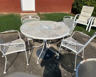 #126 White Wrought Iron w/4 chairs - 42x29 $125.00