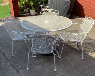 #116 White Wrought Iron Table w/4 chairs - 42x29 $125.00