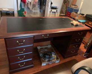 #51 Executive Laminte Desk w/6 drawers w/leather top - 66x30x30 - You Move (in a back bedroom and will have to be disassembled) has key for locking filing cabinet $75.00
